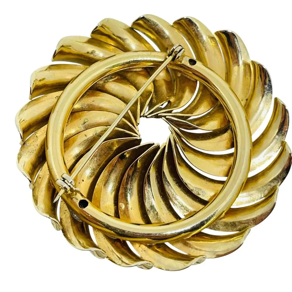 Vintage gold tone designer brooch